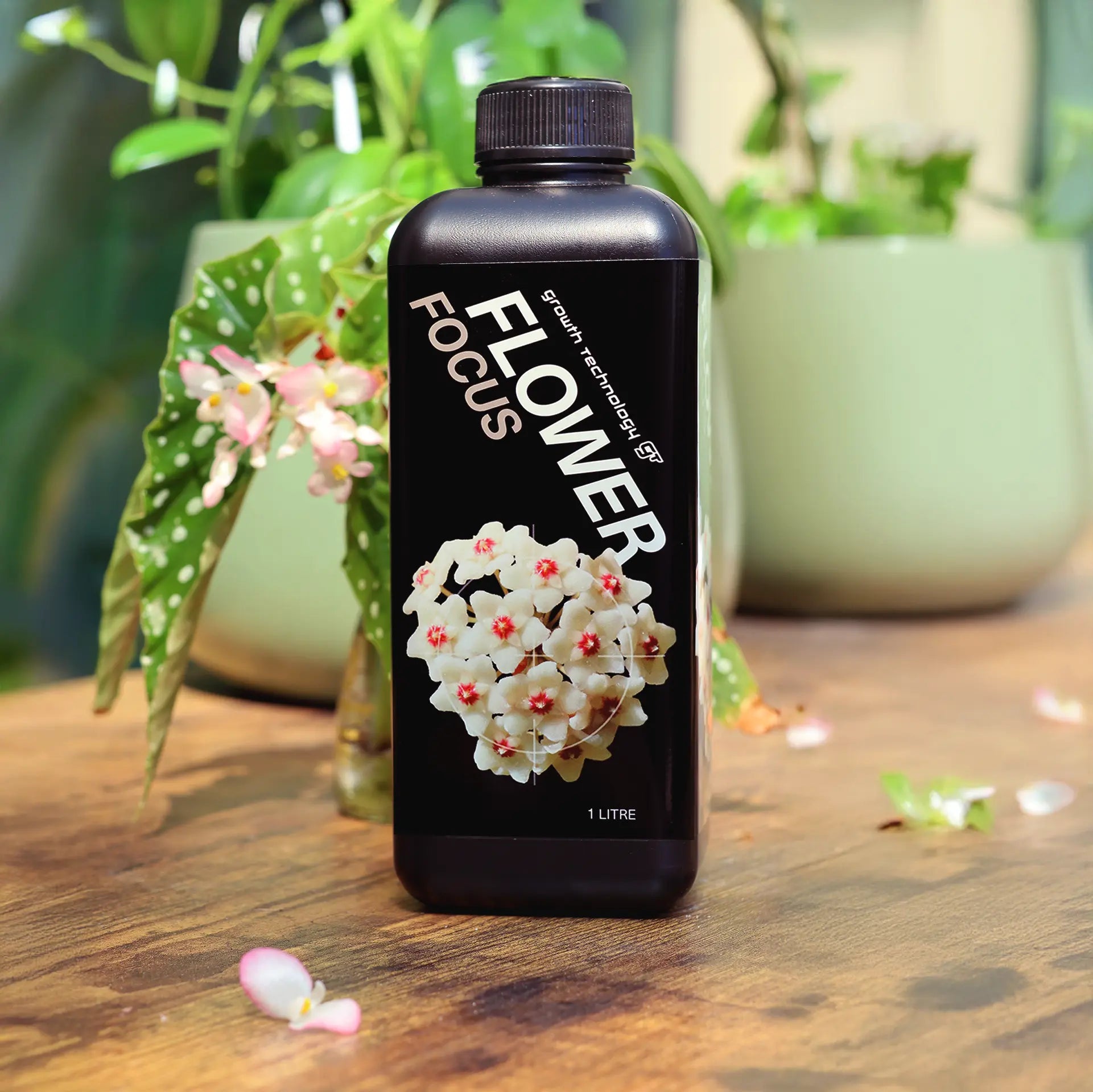 1L bottle of Flower Focus fertiliser 